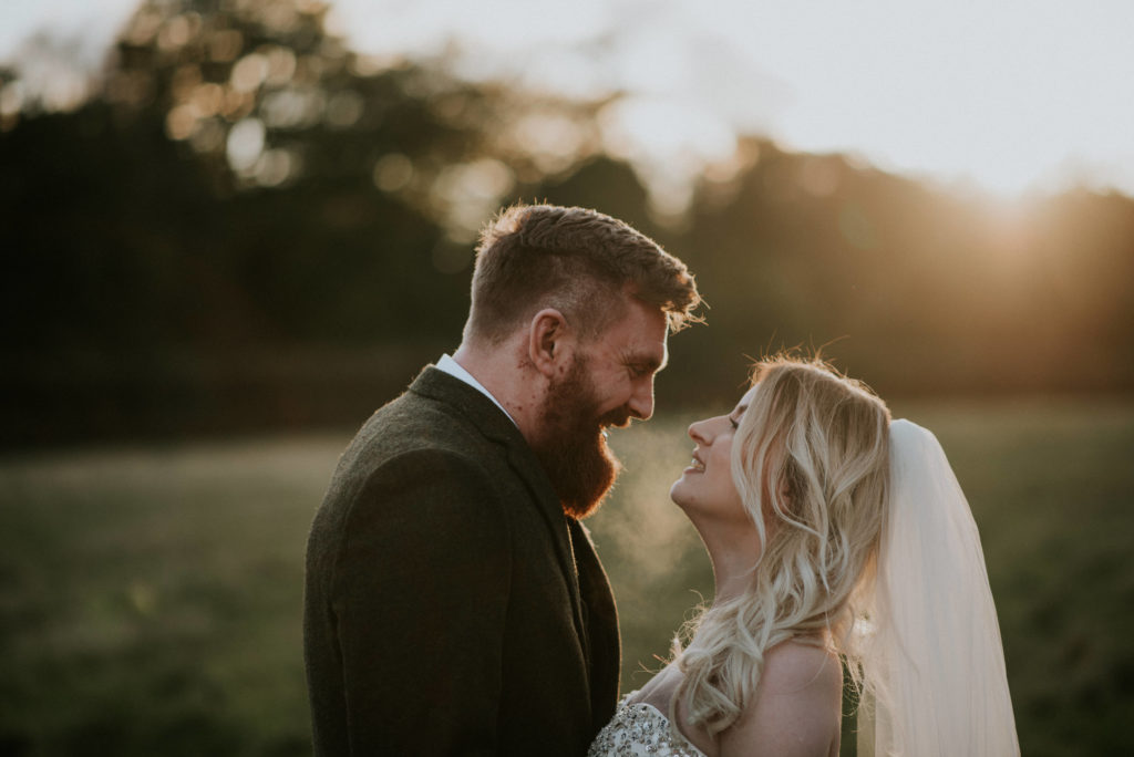 Bride and groom autumn sunset